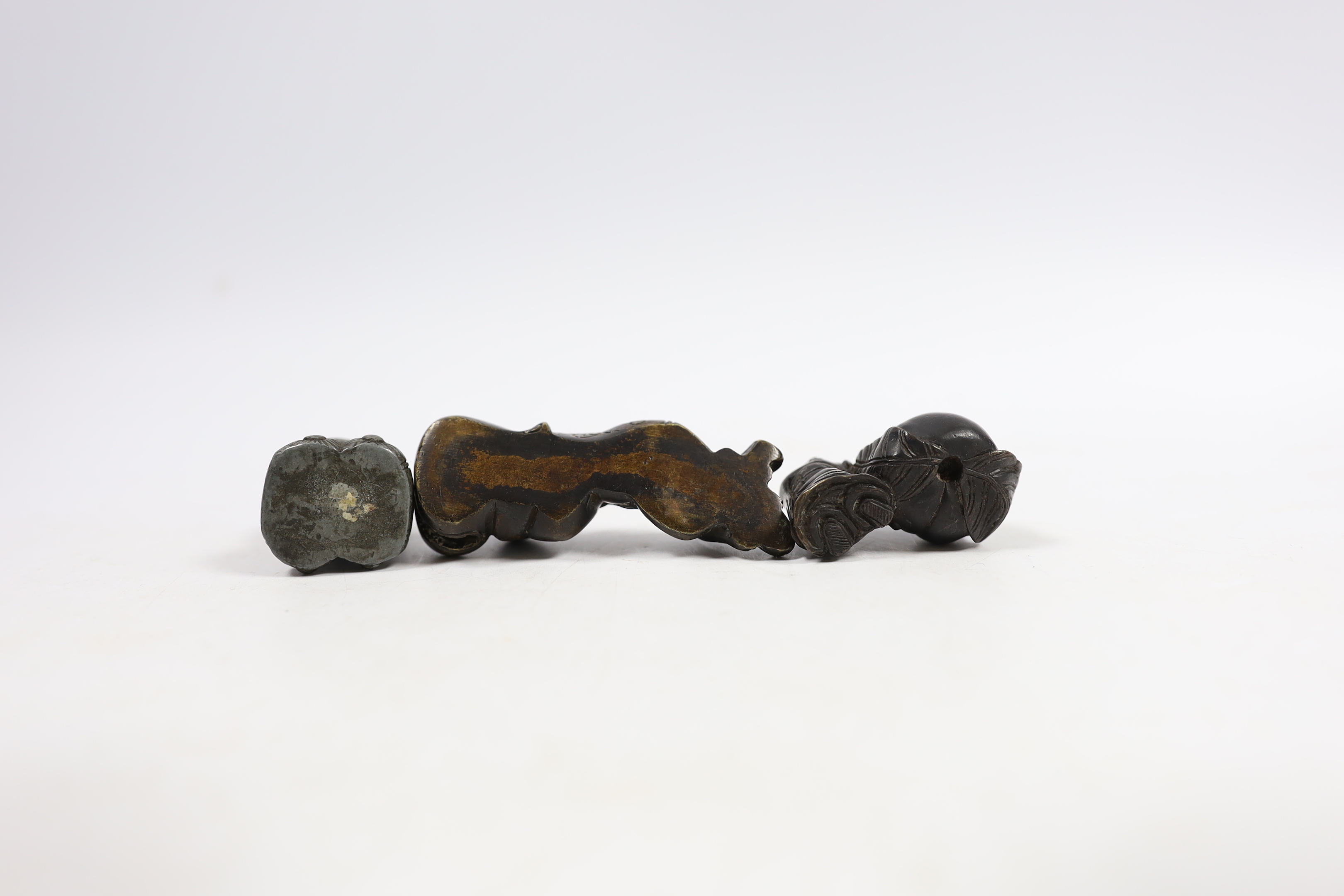 Two 19th century Japanese bronze scroll weights and an antimony figure, largest 7cm